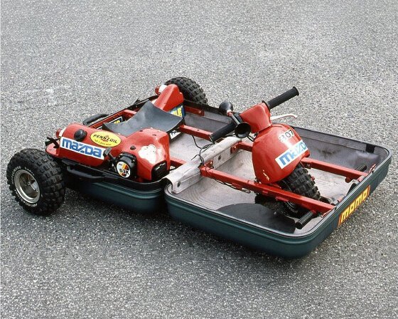 rediscover the mazda suitcase car, a portable three-wheeled vehicle that fits in a samsonite